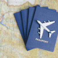 Airplane on the blue passports. Close up Airplane on the blue passports. Close up
